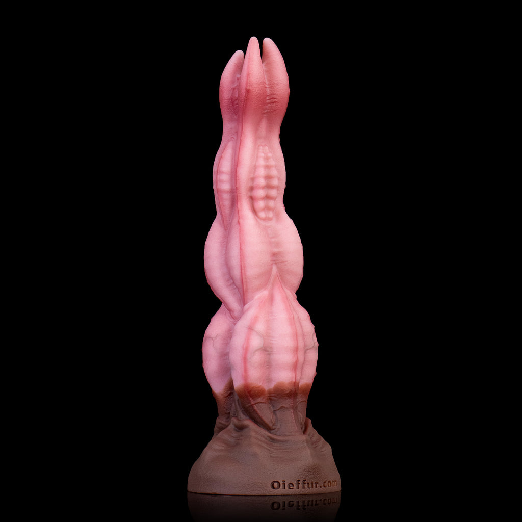 Oieffur Nagaros feathered serpent fantasy dildo made of platinum silicone, detailed with serpent and feather design.
